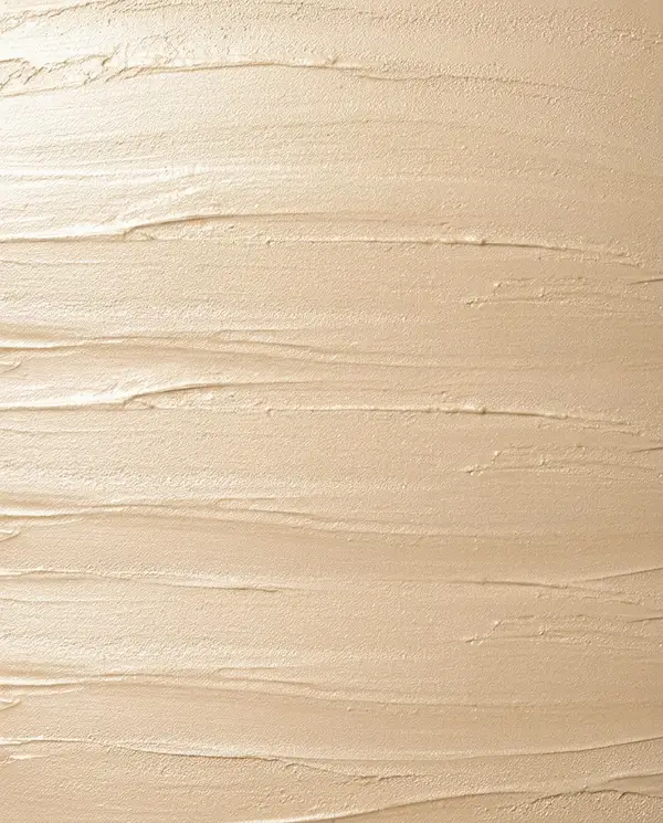Materiaalstaal van metallic stuc in de kleur champagne
