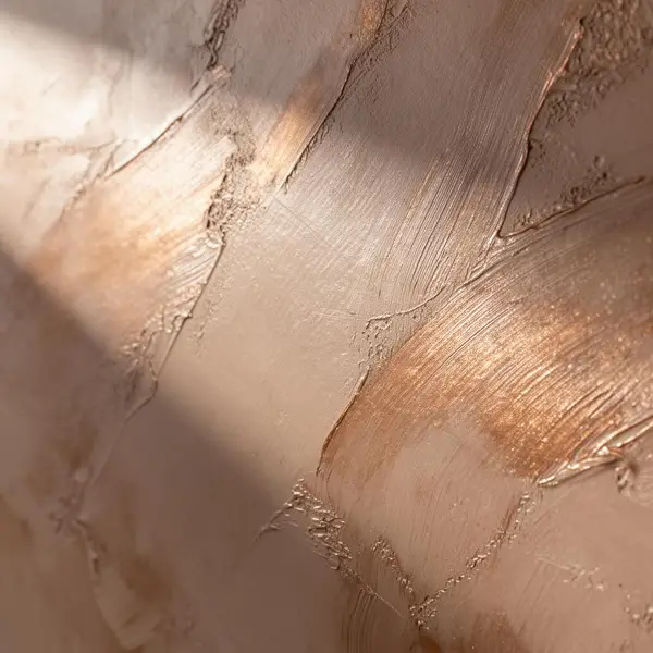 Materiaalstaal van metallic stuc in de kleur taupe